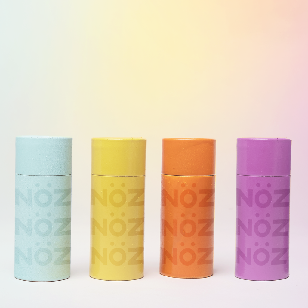 blue, yellow, orange, purple noz vegan nose sunscreen stick